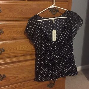 Black Polka Dot Ruffled Sleeve top.  Size medium.
